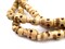 The Bead Chest Vintage-Style Carved Bone Skull Beads Long Strand 7mm Nepal Brown 46 Inch Strand